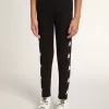 Schwarze Leggings für Mädchen mit weißen Sternen an den Seiten Schwarze Leggings für Mädchen mit weißen Sternen an den Seiten