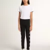 Schwarze Leggings für Mädchen mit weißen Sternen an den Seiten Schwarze Leggings für Mädchen mit weißen Sternen an den Seiten