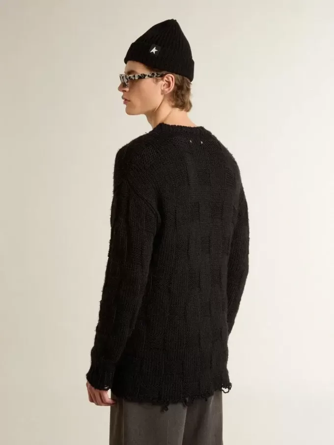 Schwarzer Herrenpullover aus Wolle mit Used-Look Schwarzer Herrenpullover aus Wolle mit Used-Look