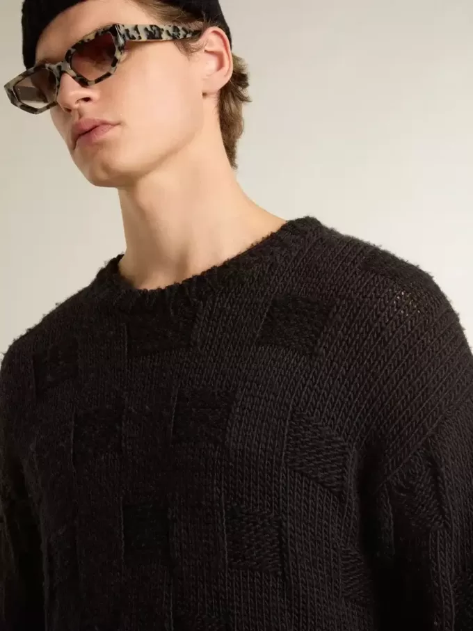 Schwarzer Herrenpullover aus Wolle mit Used-Look Schwarzer Herrenpullover aus Wolle mit Used-Look