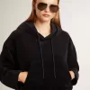 Schwarzes Chenille-Sweatshirt für Damen mit Stickerei auf dem Rücken Schwarzes Chenille-Sweatshirt für Damen mit Stickerei auf dem Rücken