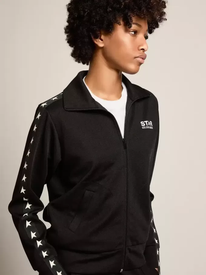 Schwarzes Damen-Sweatshirt mit Reißverschluss und weißen Sternen Schwarzes Damen-Sweatshirt mit Reißverschluss und weißen Sternen