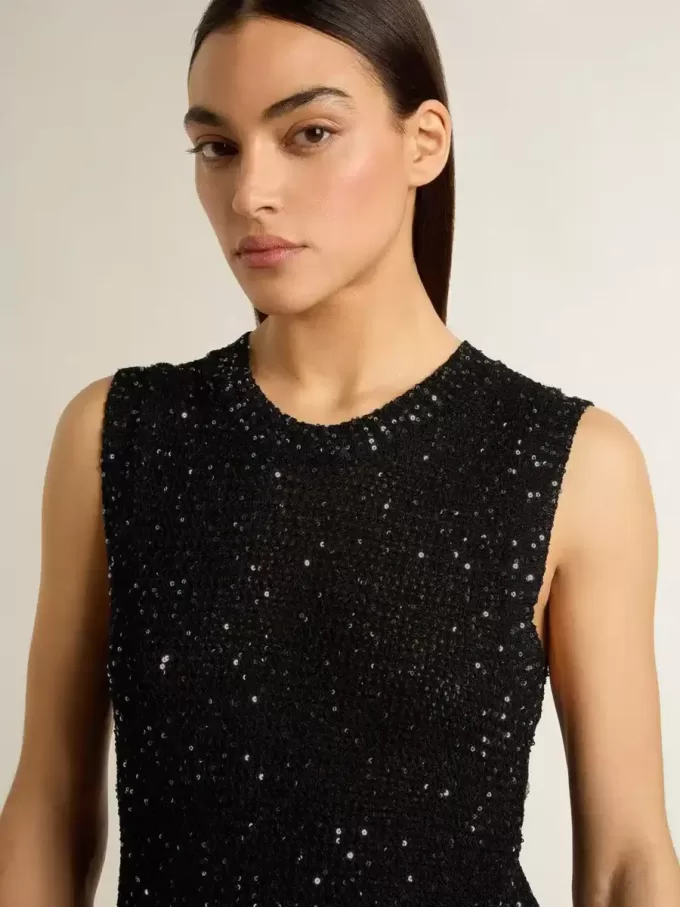 Schwarzes Mesh-Strickoberteil mit Pailletten und kontrastierenden Details