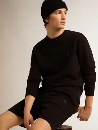 Schwarzes Sweatshirt aus der Archibald Star Collection mit ton-in-ton Stern auf der Vorderseite