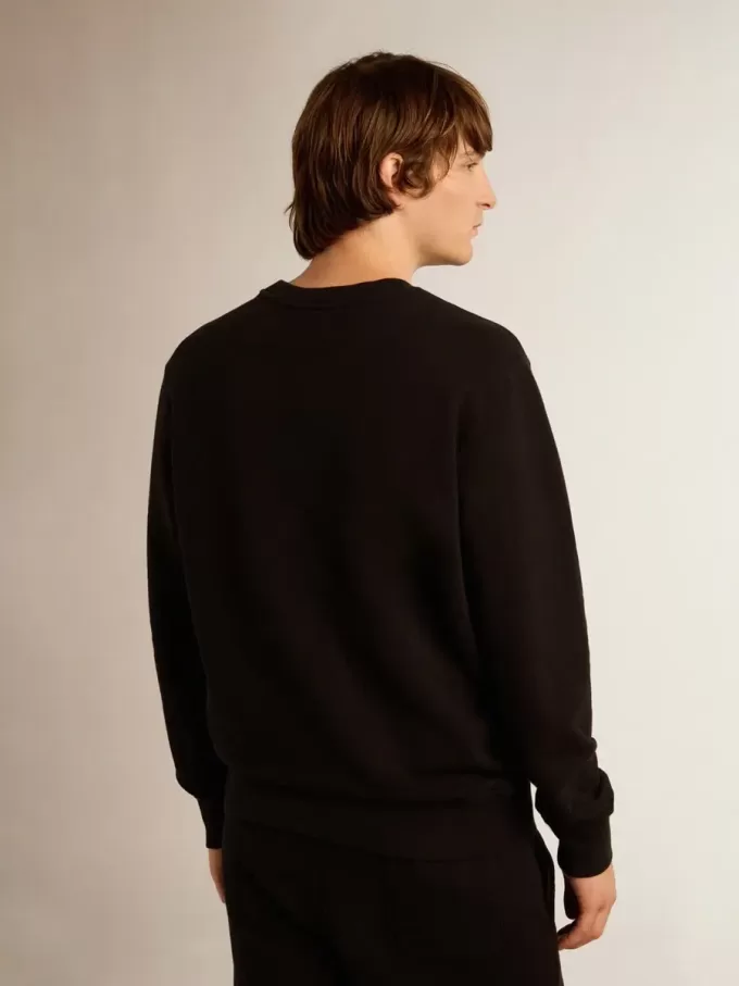 Schwarzes Sweatshirt aus der Archibald Star Collection mit ton-in-ton Stern auf der Vorderseite
