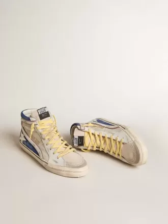 Slide aus perlfarbenem Canvas und blauem Wildleder mit weißem Lederstern und Blitz Slide aus perlfarbenem Canvas und blauem Wildleder mit weißem Lederstern und Blitz