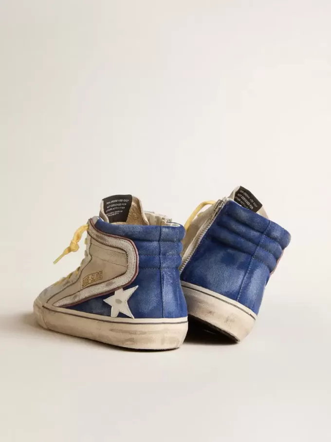 Slide aus perlfarbenem Canvas und blauem Wildleder mit weißem Lederstern und Blitz Slide aus perlfarbenem Canvas und blauem Wildleder mit weißem Lederstern und Blitz