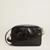 Star Bag aus glänzendem schwarzem Leder mit Ton-in-Ton-Stern