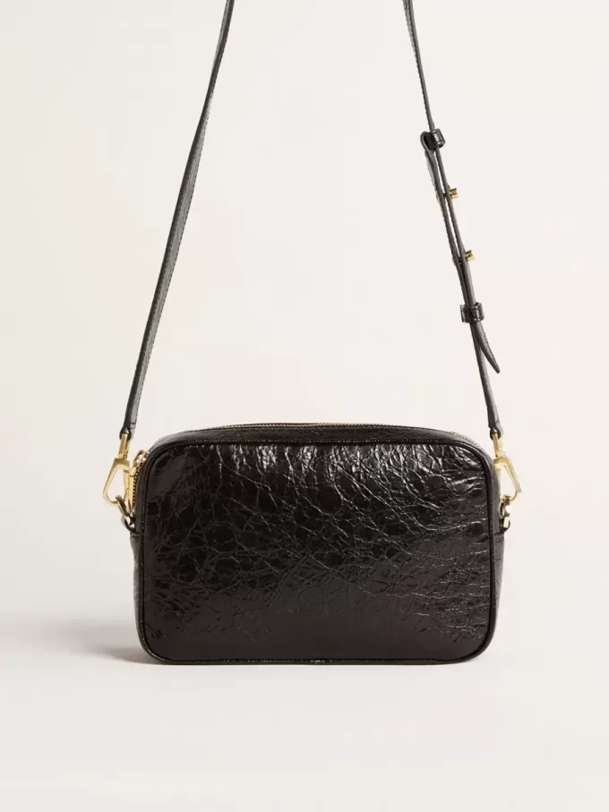 Star Bag aus glänzendem schwarzem Leder mit Ton-in-Ton-Stern