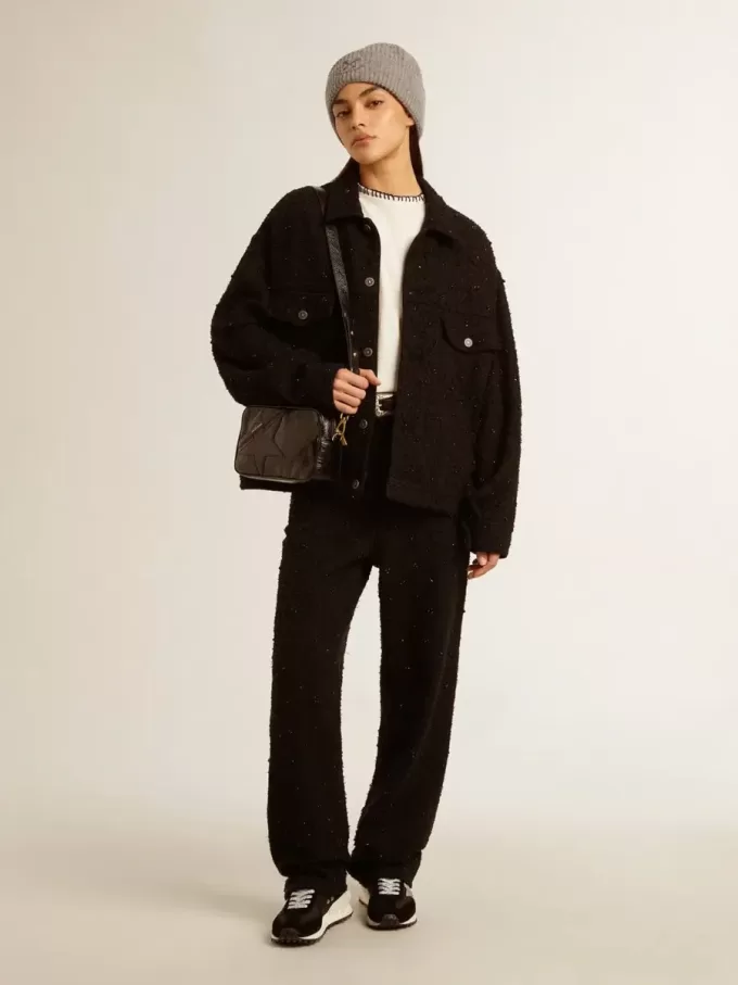 Star Bag aus glänzendem schwarzem Leder mit Ton-in-Ton-Stern