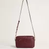 Star Bag aus weinrotem Leder mit farblich abgestimmtem Stern