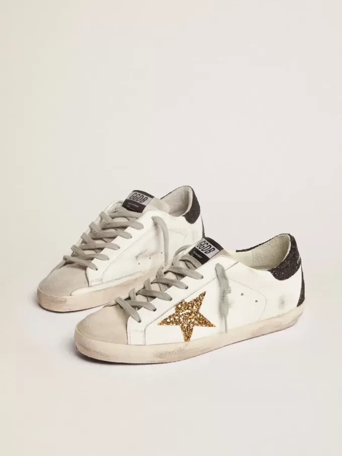 Super-Star für Damen aus Nappaleder mit goldenem Glitzerstern und schwarzer Glitzer-Fersenlasche