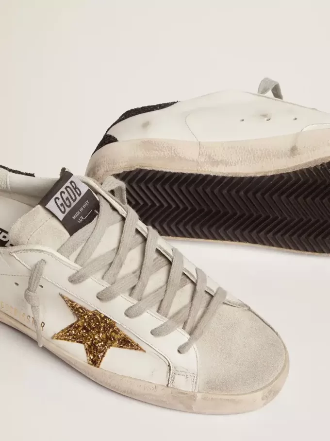 Super-Star für Damen aus Nappaleder mit goldenem Glitzerstern und schwarzer Glitzer-Fersenlasche