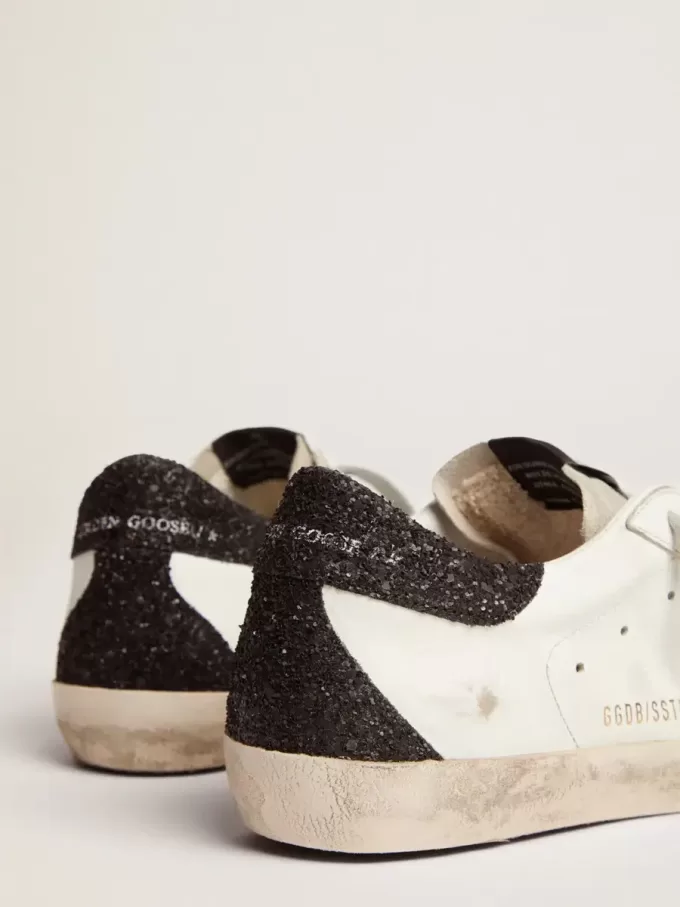 Super-Star für Damen aus Nappaleder mit goldenem Glitzerstern und schwarzer Glitzer-Fersenlasche