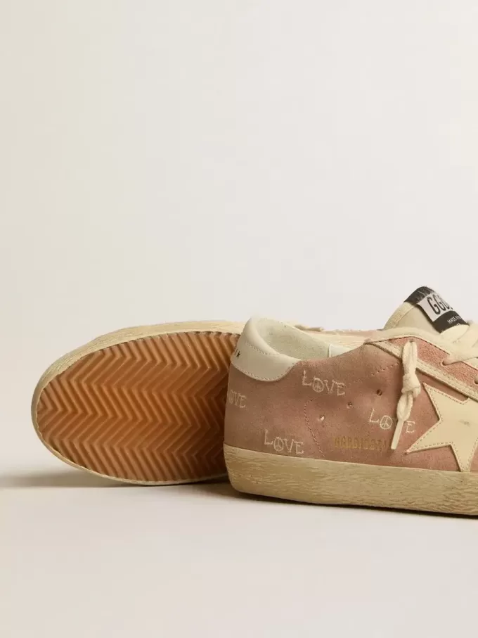 Super-Star für Damen aus puderrosa Wildleder mit cremefarbenem Lederstern Super-Star für Damen aus puderrosa Wildleder mit cremefarbenem Lederstern