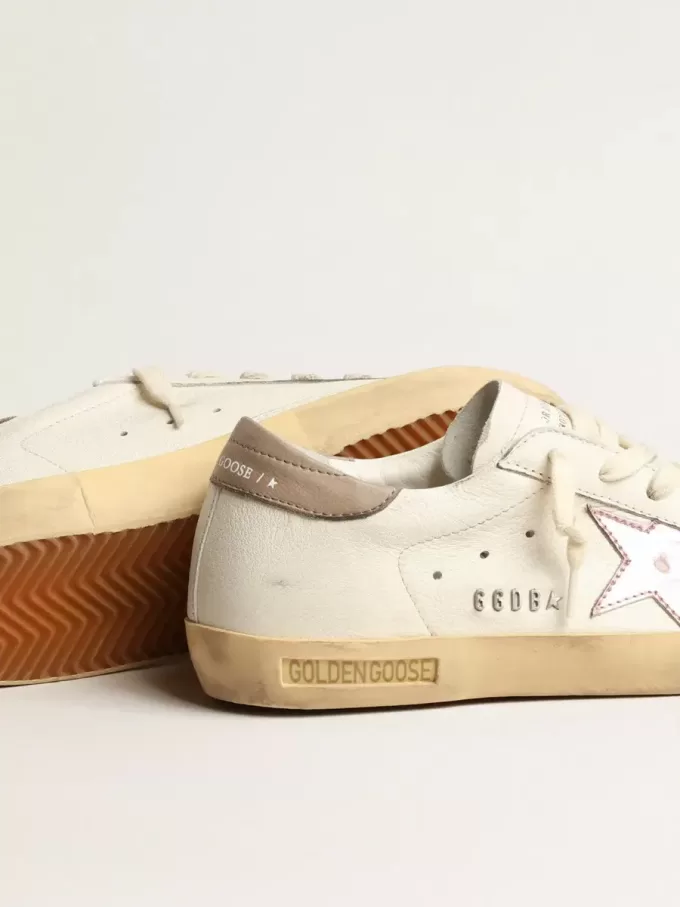 Super-Star für Damen aus weißem Nappaleder mit rosa Metallic-Lederstern
