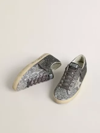 Super Star für Damen mit glitzerndem Obermaterial und silbernem Metallic-Lederstern