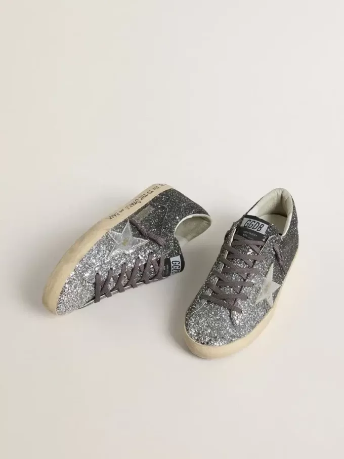 Super Star für Damen mit glitzerndem Obermaterial und silbernem Metallic-Lederstern