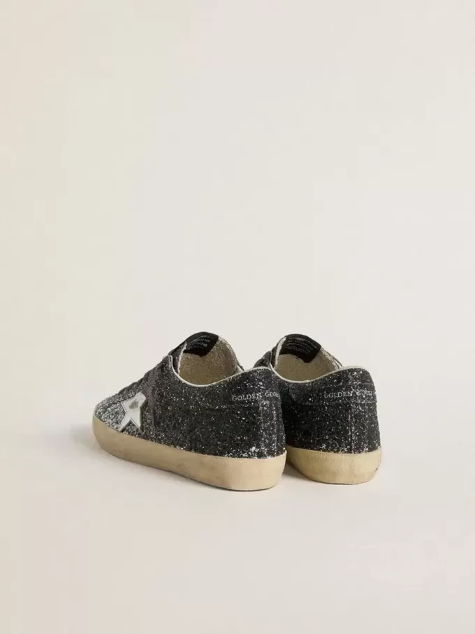 Super Star für Damen mit glitzerndem Obermaterial und silbernem Metallic-Lederstern