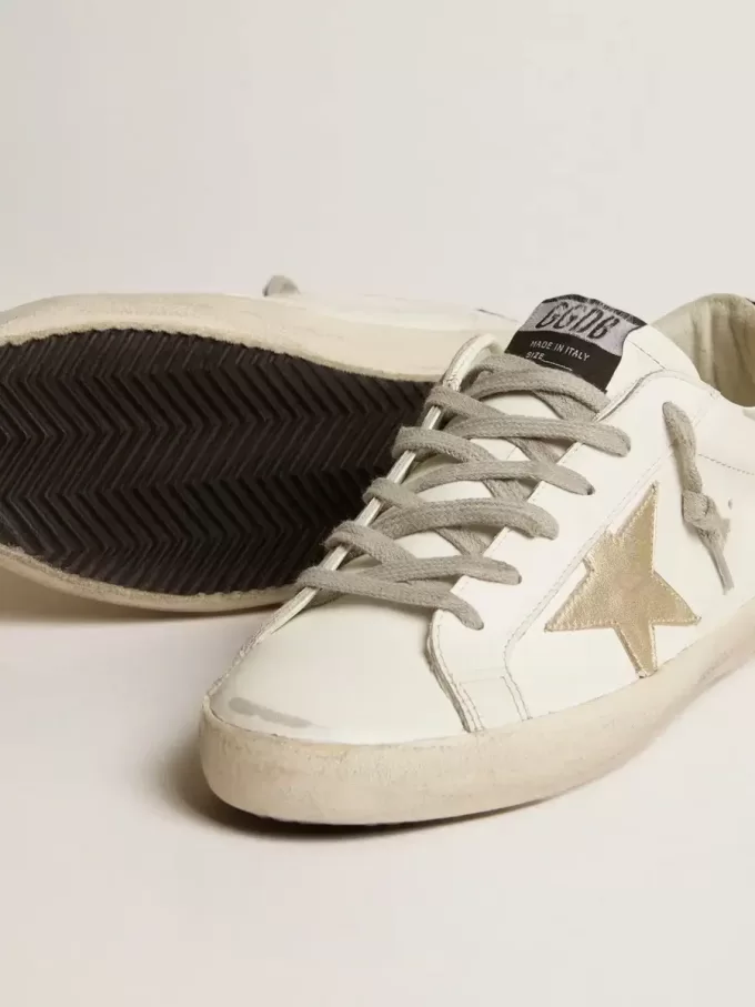 Super-Star für Damen mit goldenem Stern und schwarzem Glitzer-Fersenriemen