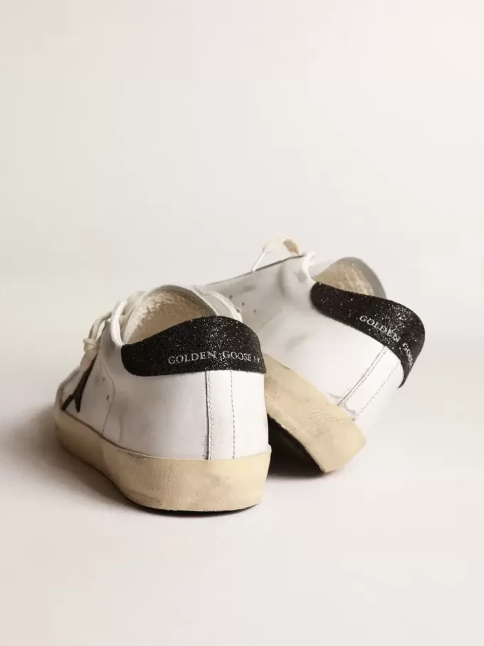 Super-Star für Damen mit schwarzem Swarovski-Kristallstern und Fersenlasche Super-Star für Damen mit schwarzem Swarovski-Kristallstern und Fersenlasche