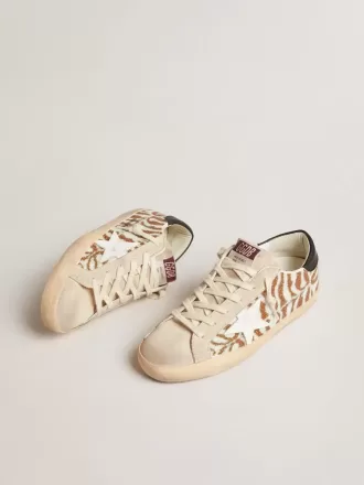Super-Star LTD aus Swarovski-Kristallen mit Zebra-Effekt und weißem Lederstern