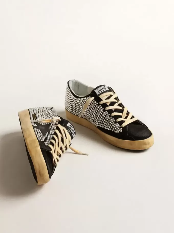 Super-Star LTD mit Swarovski-Kristallen und schwarzem Lederstern