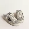 Super-Star Sabot für Damen in silbernem Glitzer mit schwarzem Lederstern Super-Star Sabot für Damen in silbernem Glitzer mit schwarzem Lederstern