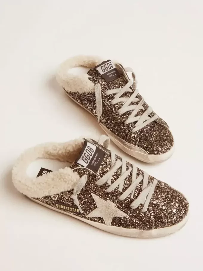 Super-Star Sabot für Damen mit Glitzer und Lammfellfutter Super-Star Sabot für Damen mit Glitzer und Lammfellfutter