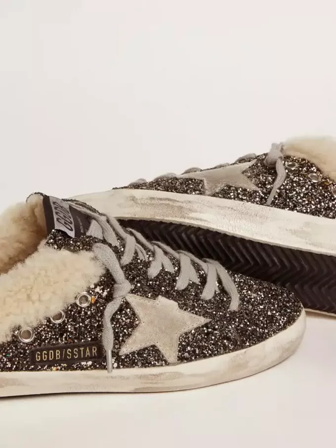 Super-Star Sabot für Damen mit Glitzer und Lammfellfutter Super-Star Sabot für Damen mit Glitzer und Lammfellfutter
