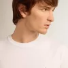 T-Shirt aus der White Star Collection mit schwarzem Stern auf der Vorderseite T-Shirt aus der White Star Collection mit schwarzem Stern auf der Vorderseite