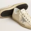 V-Star aus beigem Canvas mit silbernem Glitzerstern V-Star aus beigem Canvas mit silbernem Glitzerstern