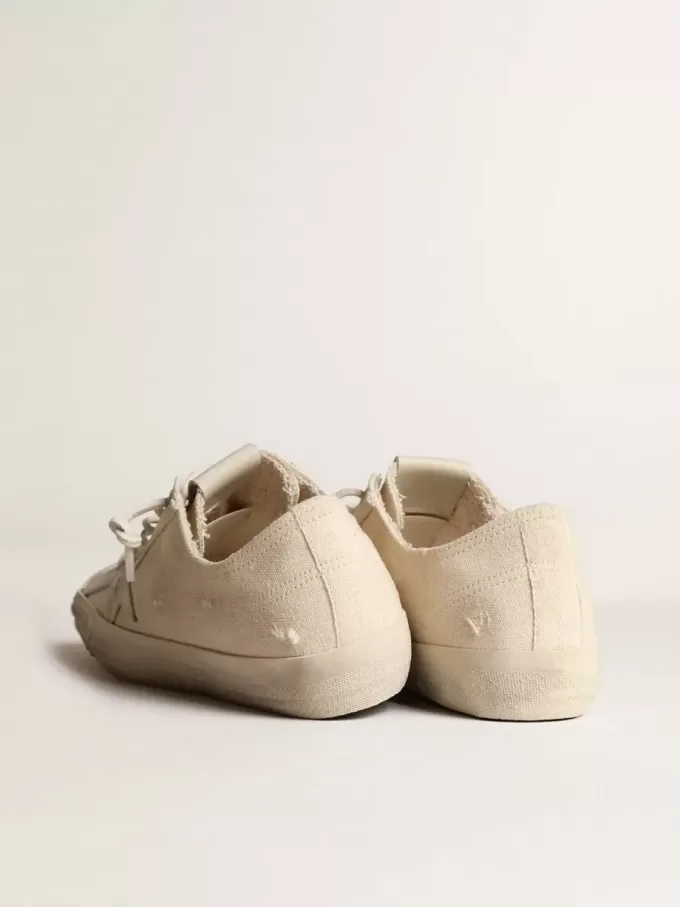 V-Star aus hellcremefarbenem Canvas mit milchweißem Lederstern