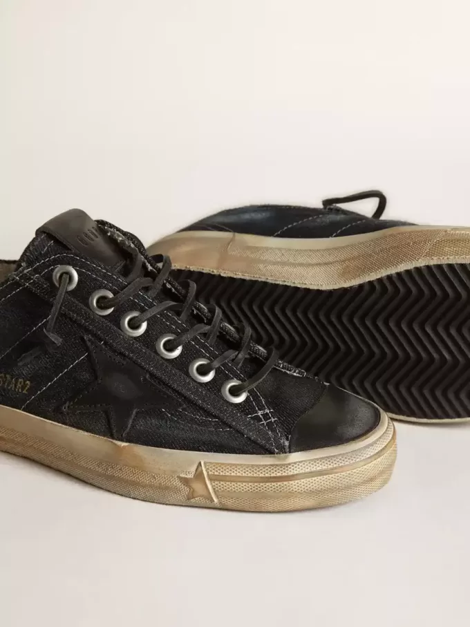 V-Star aus mitternachtsblauem Denim mit schwarzem Lederstern und Zehenkappe