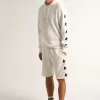 Vintage-weiße Bermudashorts für Herren mit kontrastierenden schwarzen Sternen Vintage-weiße Bermudashorts für Herren mit kontrastierenden schwarzen Sternen
