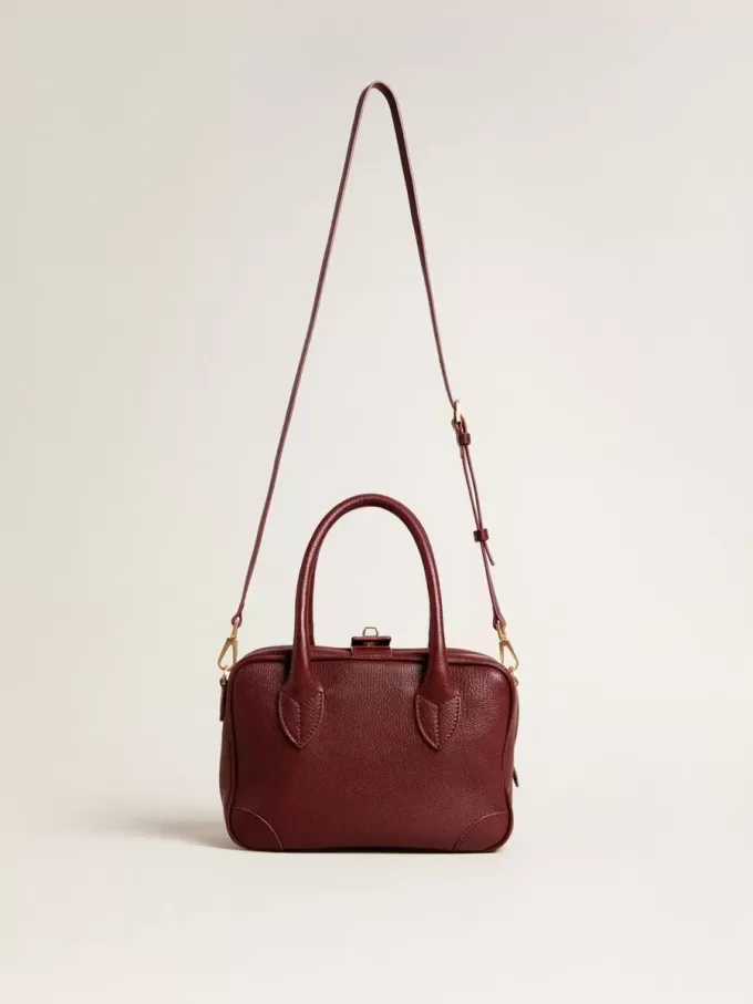 Vita Bag aus burgunderrotem Leder mit goldenen Details