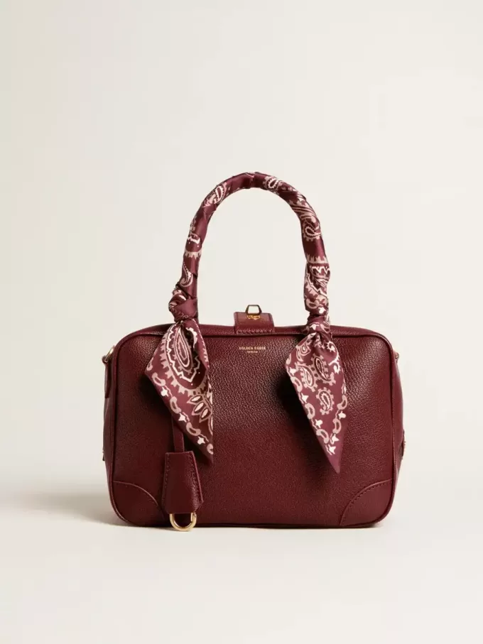 Vita Bag aus burgunderrotem Leder mit goldenen Details