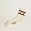 Weiß getrunkene Socken mit Used-Details und braunen Streifen Weiß getrunkene Socken mit Used-Details und braunen Streifen