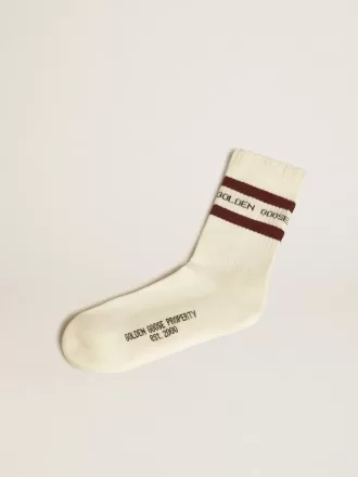 Weiß getrunkene Socken mit Used-Details und braunen Streifen