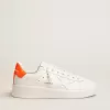 Weiße Purestar-Sneaker mit fluoreszierendem orangefarbenem Fersenriemen Weiße Purestar-Sneaker mit fluoreszierendem orangefarbenem Fersenriemen