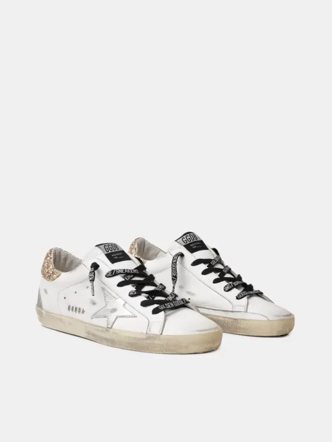 Weiße Super-Star-Damenschuhe aus Leder mit glitzernder Fersenlasche