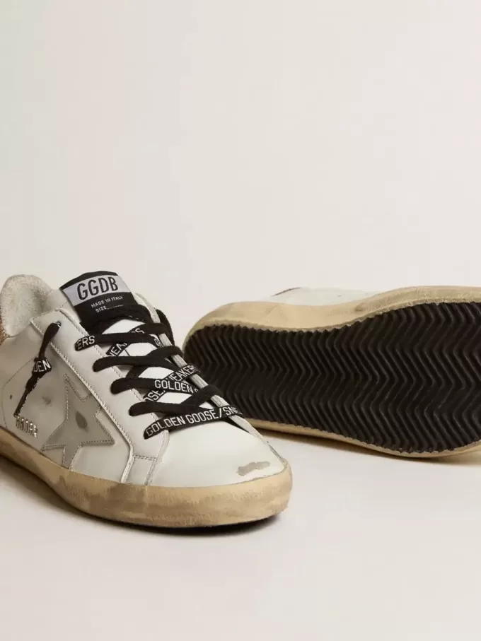 Weiße Super-Star-Damenschuhe aus Leder mit glitzernder Fersenlasche