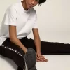 Weißes Damen-T-Shirt mit silbernem Glitzerlogo und Stern