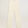 Weite Damenhose aus abgenutztem, weißem Stoff