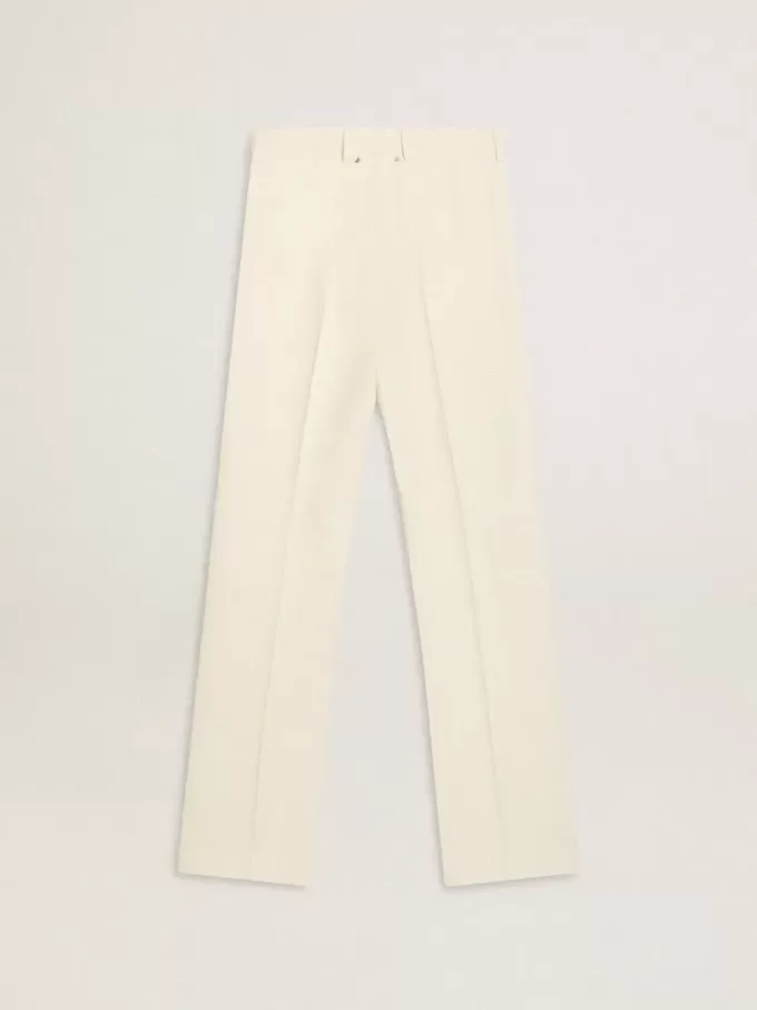 Weite Damenhose aus abgenutztem, weißem Stoff