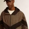 Windjacke in Beige und Schwarz mit Hahnentrittmuster
