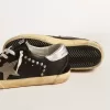Women’s Super-Star aus schwarzem Leder und Wildleder mit silbernen Nieten